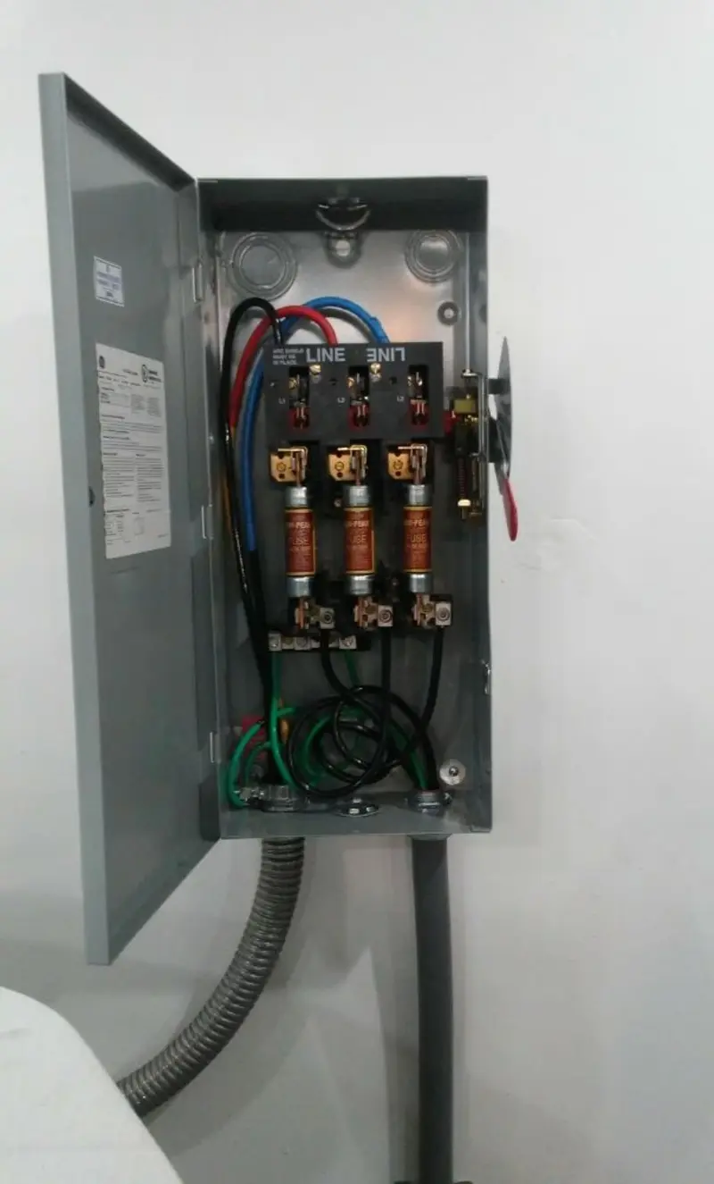 Three-phase disconnect switch installed for Smoke Detector Installation in Camden